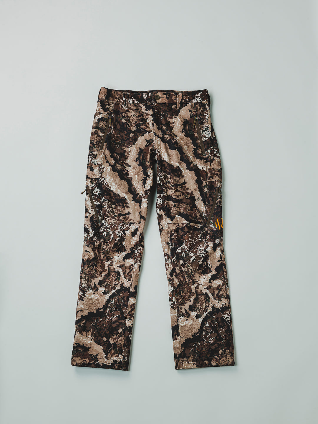 The Veil® Camo Field Pant is the most talked-about pant coming out for your next hunt. This multi-season, multi-purpose pant is comfortable and offers an athletic fit. With double weave 4-way stretch you can't go wrong with this pant!  PROTECTION Quick-drying, Windproof, Water Resistant. MATERIAL Exterior: 92% Polyester 8% Synthetic Fiber. FIT: Midweight and Multi-Season. CONDITIONS Mild, Dry, Cold, Wet, Wind. PATTERN Veil® Camo in Grind.Multi-Season Gear & Pursuits