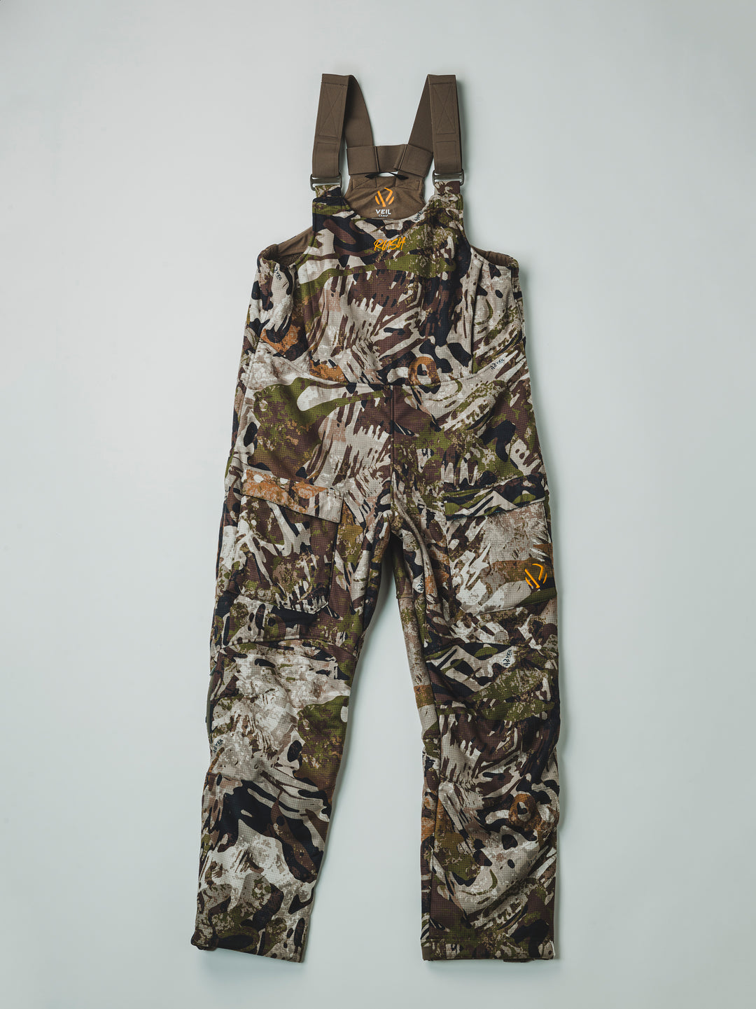 The Chaos Fleece Bib is the ideal piece to have on your next hunt, providing ultimate windproof and warmth, keeping you dry on those cold and snowy days.PROTECTION Quick-drying | Windproof | Waterproof MATERIAL Exterior: 100% Brushed Polyester Fleece Mid-layer: 3L Lamination Interior: High-pile fleece FIT Midweight | Multi-season CONDITIONS Mild | Dry | Cold | Wet | Wind PATTERN Veil® Camo - Rush | Veil® Camo - Shred | Veil® Camo - Grind
