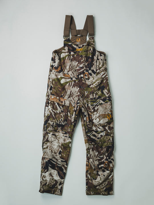 The Chaos Fleece Bib is the ideal piece to have on your next hunt, providing ultimate windproof and warmth, keeping you dry on those cold and snowy days.PROTECTION Quick-drying | Windproof | Waterproof MATERIAL Exterior: 100% Brushed Polyester Fleece Mid-layer: 3L Lamination Interior: High-pile fleece FIT Midweight | Multi-season CONDITIONS Mild | Dry | Cold | Wet | Wind PATTERN Veil® Camo - Rush | Veil® Camo - Shred | Veil® Camo - Grind