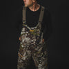 The Chaos Fleece Bib is the ideal piece to have on your next hunt, providing ultimate windproof and warmth, keeping you dry on those cold and snowy days.PROTECTION Quick-drying | Windproof | Waterproof MATERIAL Exterior: 100% Brushed Polyester Fleece Mid-layer: 3L Lamination Interior: High-pile fleece FIT Midweight | Multi-season CONDITIONS Mild | Dry | Cold | Wet | Wind PATTERN Veil® Camo - Rush | Veil® Camo - Shred | Veil® Camo - Grind